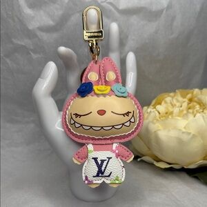 Pink Monster Character Keychain with Floral Details